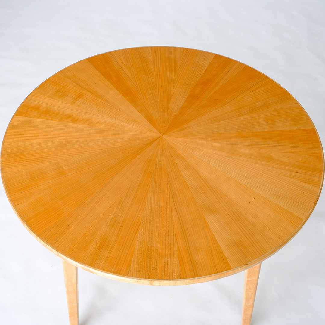 Table top with radially arranged wood